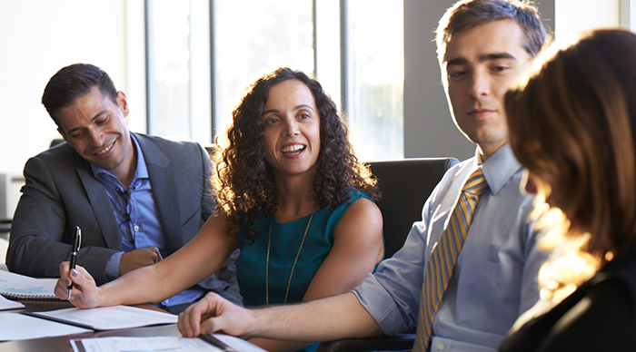 People collaborating at a workplace and sharing their views