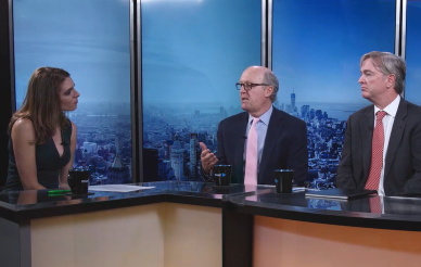 Interviewer interviewing the business delegates 