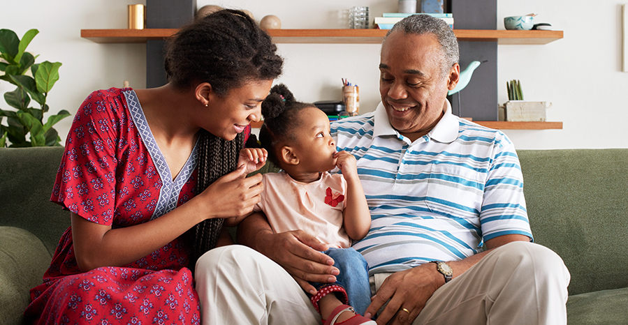 Retiree couple with grandchild