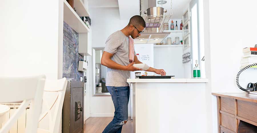 Man cooking in kitchen